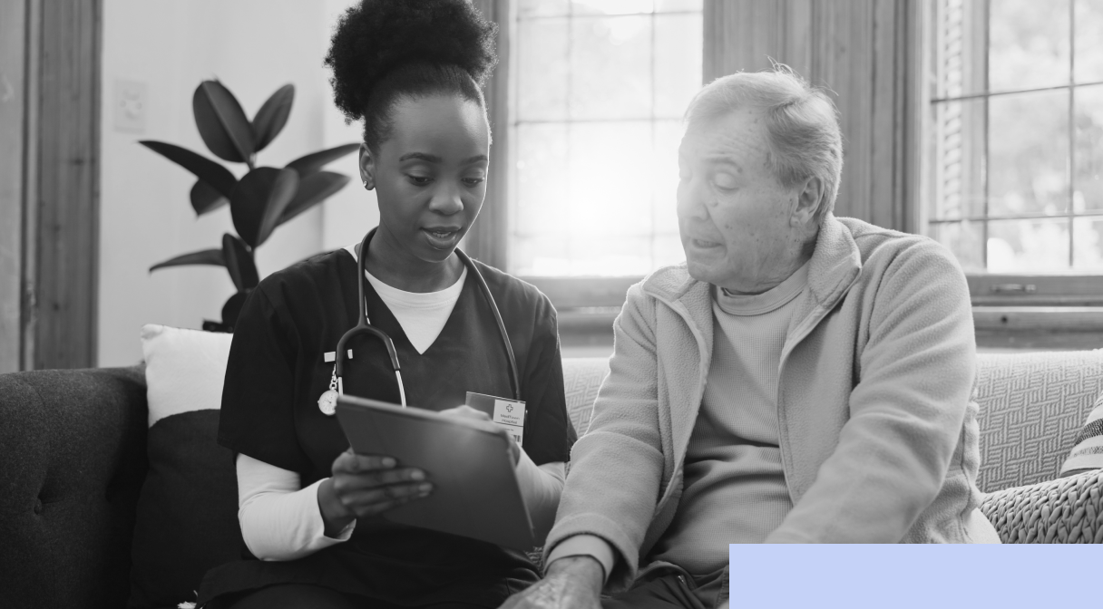 african carer with caucasian old man