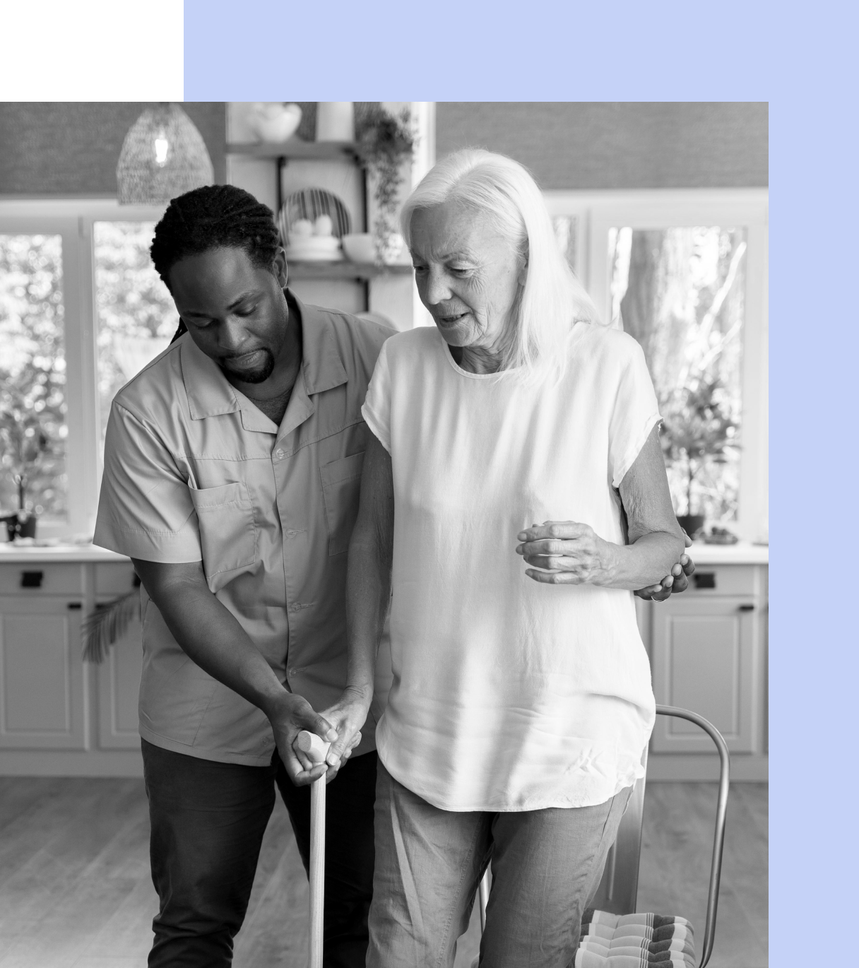 carer holding lady's hand